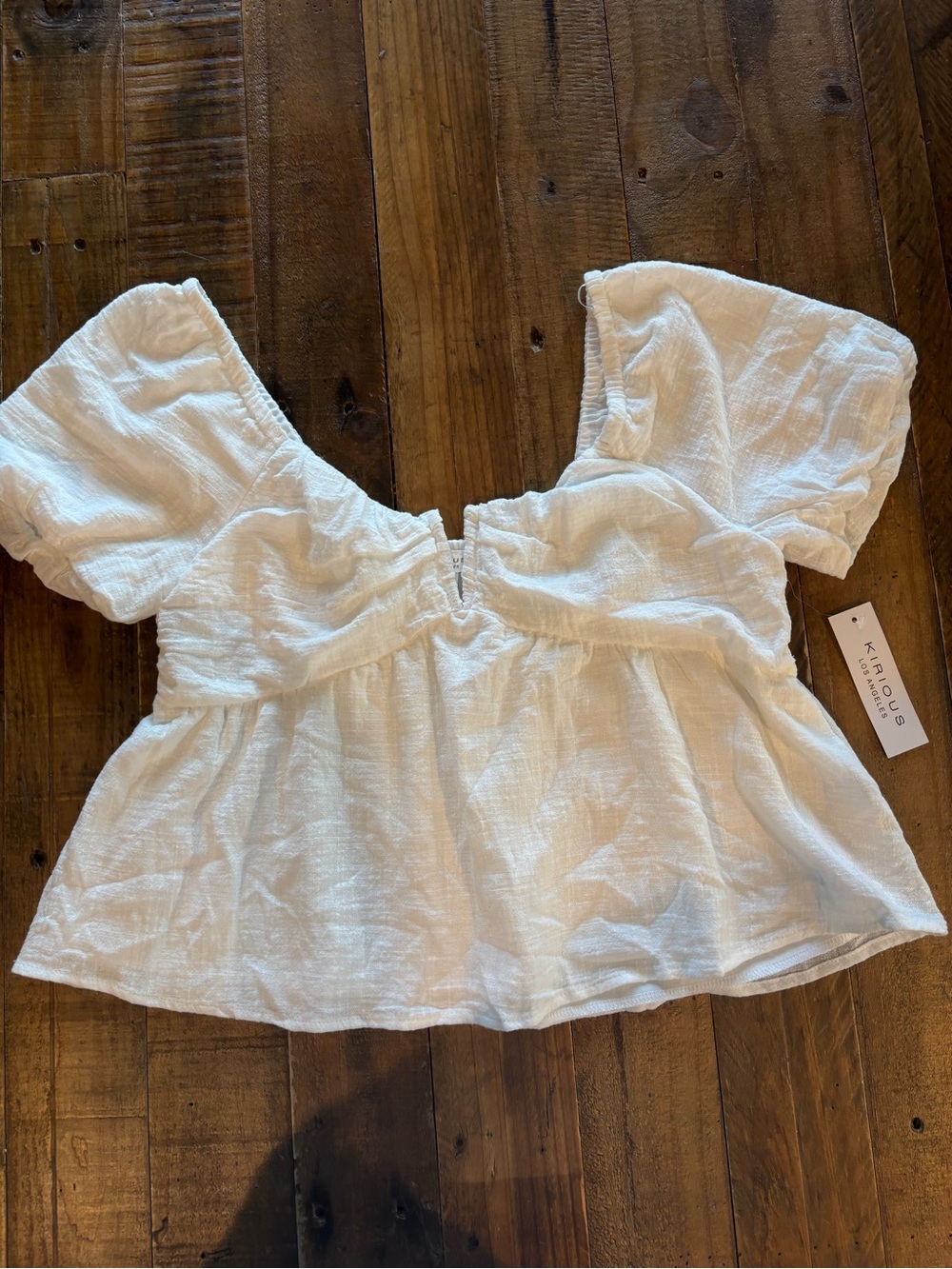 White Puff-Sleeve Peplum Top